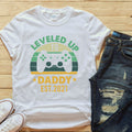 Leveled Up to Daddy with custom Year T-Shirt - Pregnancy Announcement Gift for Husband, Baby Reveal, Becoming a Daddy, Perfect Father's Day Shirt for Men