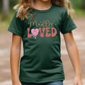Madley Loved Kids Funny T-Shirt - Cute & Comfy Graphic Tee for Boys & Girls - Perfect Gift for Birthdays, Playdates, Parties & Everyday Casual Wear
